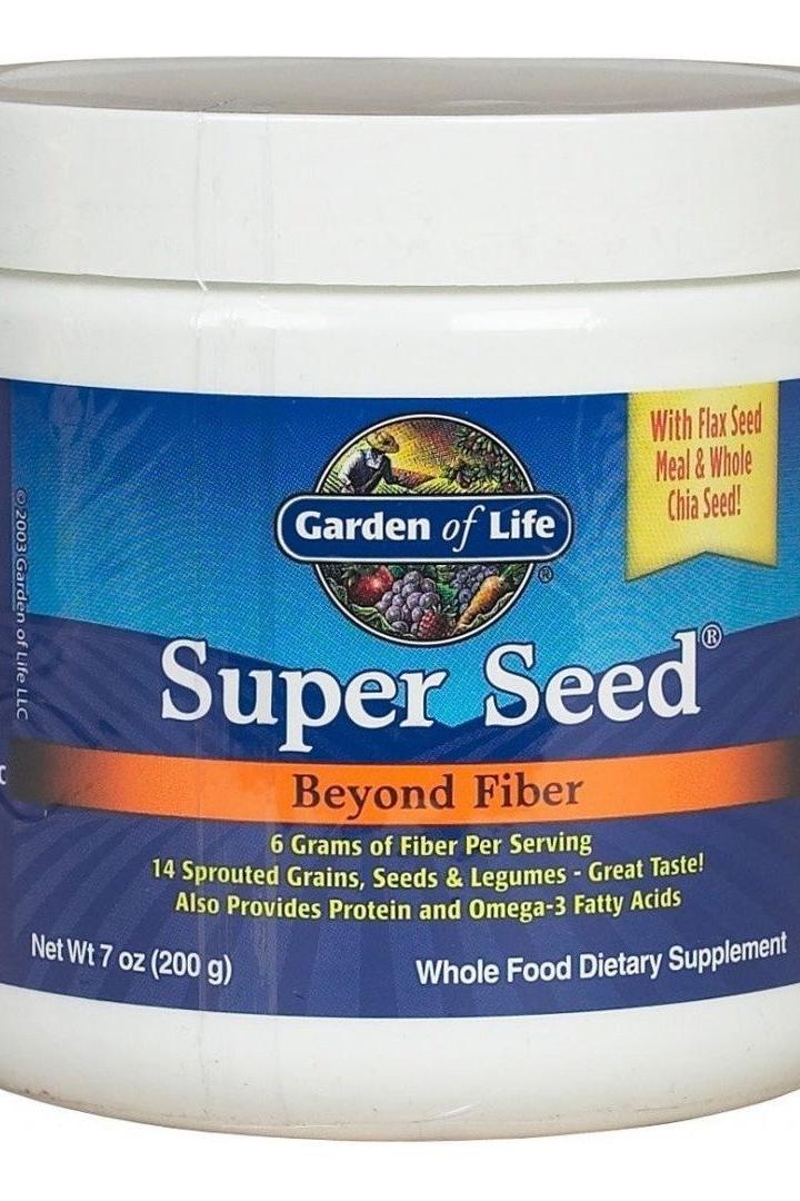 Garden of Life Super Seed supplement jar, rich in fiber with sprouted grains, seeds, and legumes for gut health.