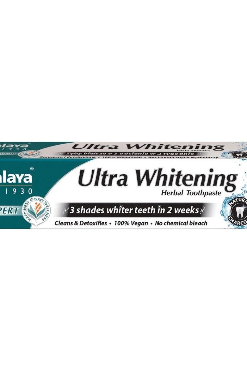 Himalaya Ultra Whitening Herbal Toothpaste packaging, promotes 3 shades whiter teeth in 2 weeks, vegan, no chemical bleach.