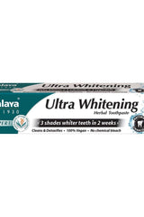 Himalaya Ultra Whitening Herbal Toothpaste packaging, promotes 3 shades whiter teeth in 2 weeks, vegan, no chemical bleach.