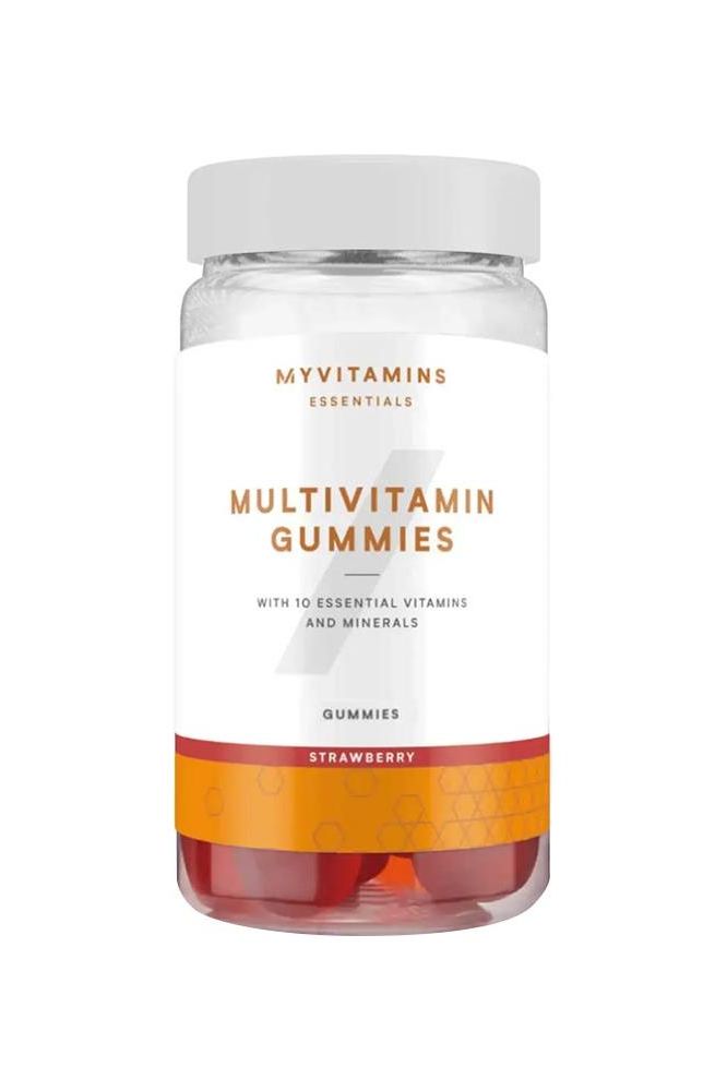 Myprotein Myvitamins Multivitamin Gummies jar with strawberry flavor, featuring 10 essential vitamins and minerals.