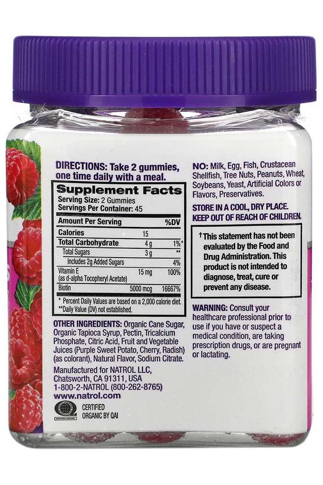 Natrol Hair, Skin & Nails Raspberry Gummies bottle with supplement facts and serving instructions.