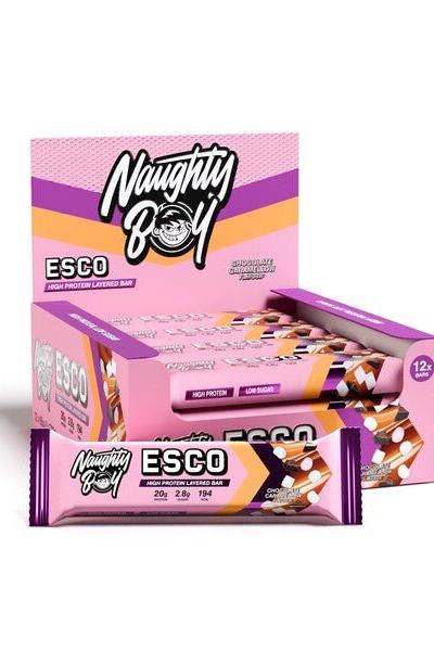 Naughty Boy ESCO Protein Bar box and bar packaging, featuring high protein nutrition, 12 count, colorful design.
