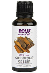 NOW Foods 100% pure cinnamon cassia essential oil in a 30 ml bottle with aromatic cinnamon sticks.