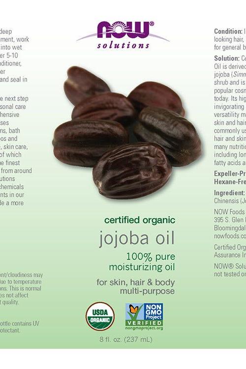 NOW Solutions organic jojoba oil label highlighting benefits for skin, hair, and body in a 237 ml bottle.