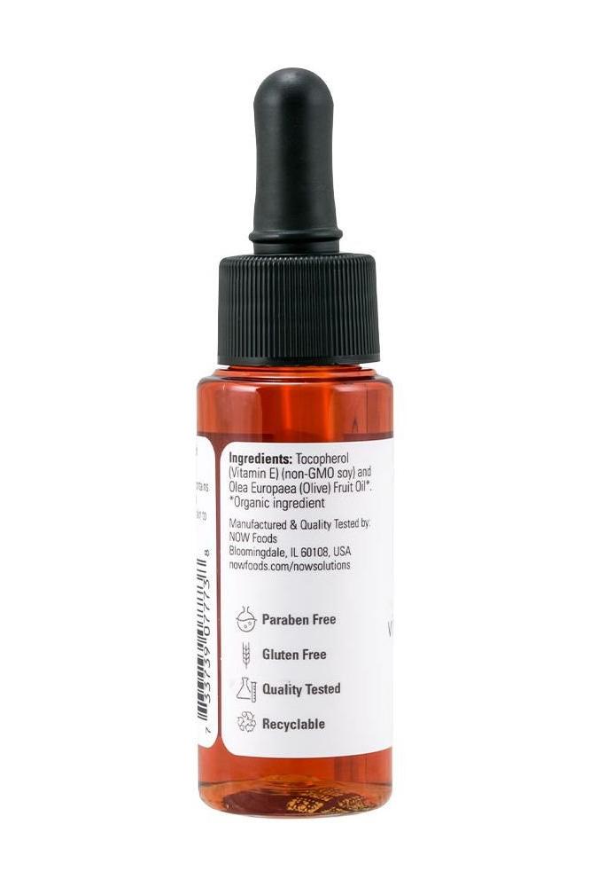Now Foods Vitamin E Oil 23,000 IU in amber dropper bottle, highlighting natural skincare benefits.