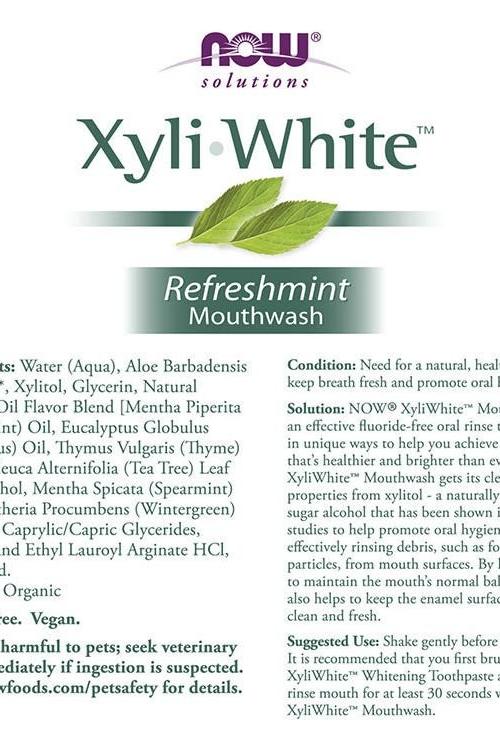 Now Foods XyliWhite Refreshmint Mouthwash label highlighting ingredients and usage instructions.