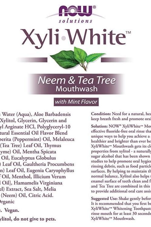 Now Foods XyliWhite Neem & Tea Tree Mouthwash label featuring mint flavor ingredients.