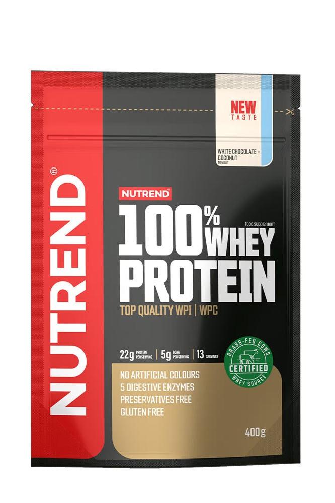 Nutrend 100% Whey Protein packaging, featuring white chocolate flavor, 22g protein, gluten-free, no preservatives.