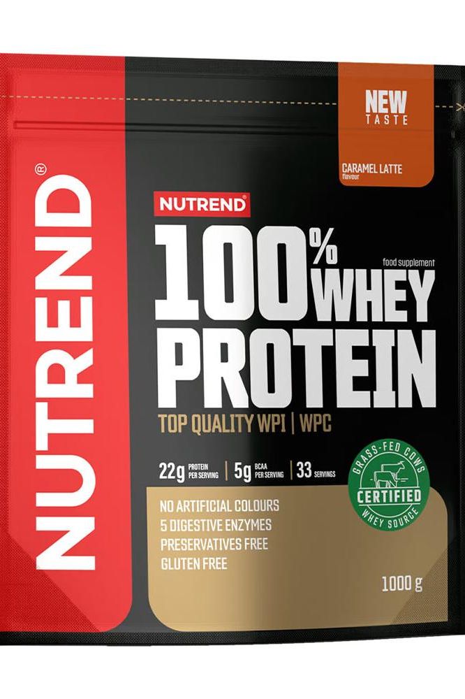 Nutrend 100% Whey Protein packaging featuring caramel latte flavor, 22g protein per serving, gluten-free, and top quality WPI/WPC.