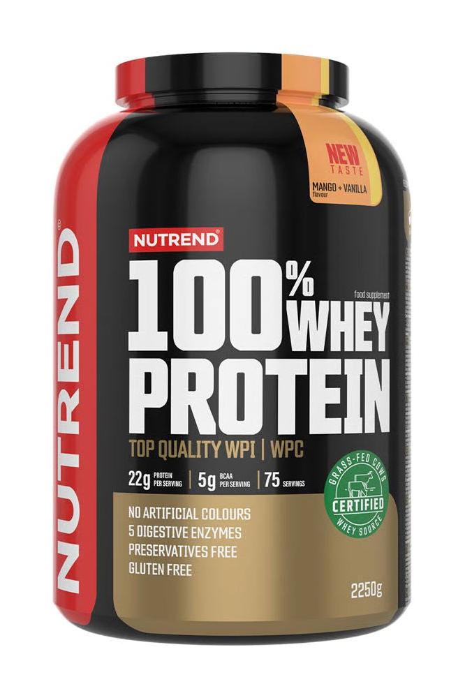 Nutrend 100% Whey Protein in a black and red container, featuring mango-vanilla flavor and key nutrition details.