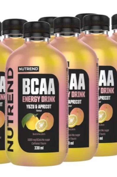 Nutrend BCAA Energy Drink with Yuzu and Apricot flavor, 330 ml bottles, energizing and sugar-free beverage.