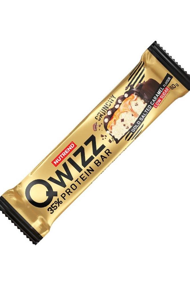 Nutrend Qwizz Protein Bar featuring gold salted caramel flavor, low sugar, gluten-free, and high fiber content.