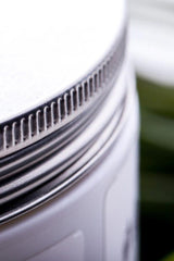 Close-up of the lid of Nutriversum BCAA Flow container showcasing its sleek design.