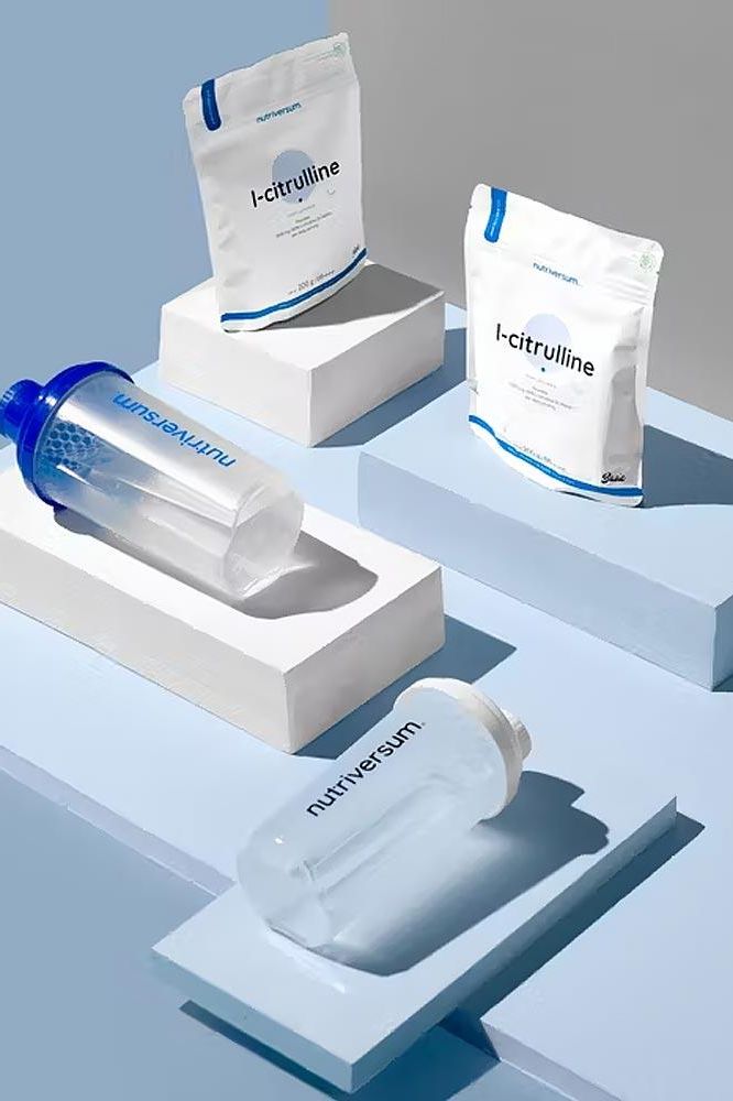 Nutriversum L-Citrulline unflavored powder packets and shaker bottle on display.