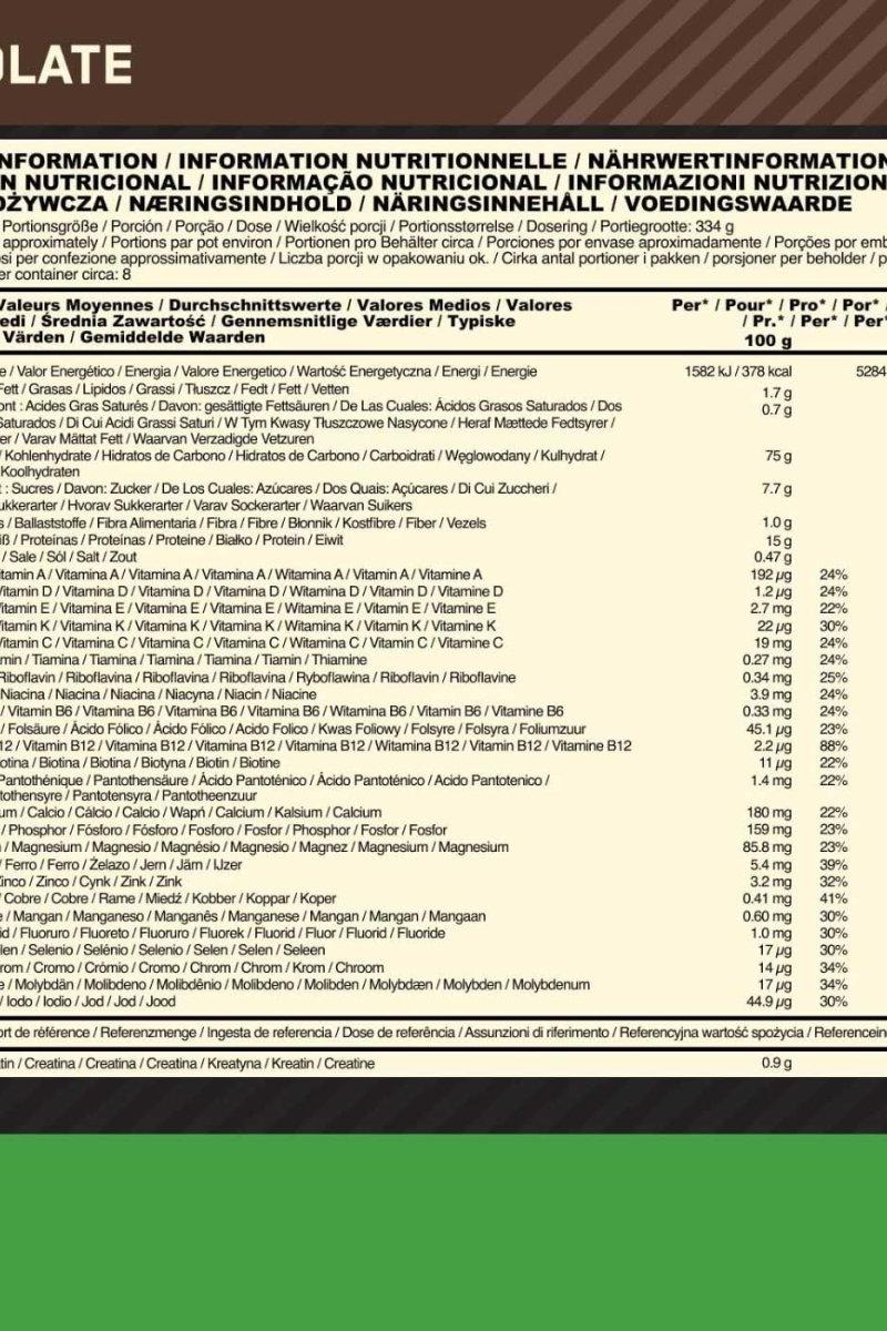 Nutrition label for Optimum Nutrition Serious Mass in multiple languages, detailing calories, protein, carbohydrates, and vitamins.