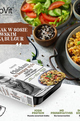 OstroVit chicken dish in hunter-style sauce with bulgur, garnished with fresh vegetables, showcasing high protein content.