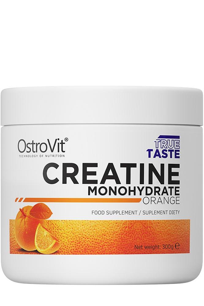 OstroVit Creatine Monohydrate supplement in orange flavor, 300g container for muscle strength and energy boost.