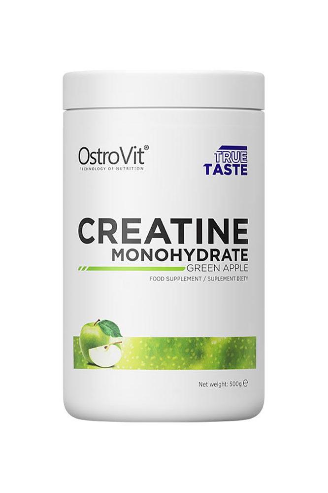 OstroVit Creatine Monohydrate supplement with green apple flavor in a 500g container.