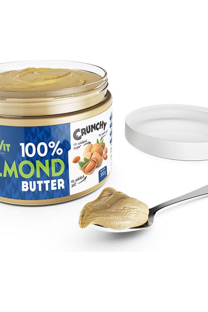 OstroVit Nutvit 100% Almond Butter jar with a spoonful on the side, highlighting its crunchy texture and healthy ingredients.
