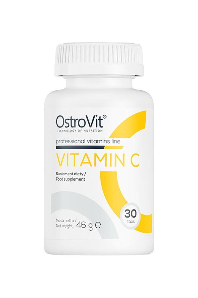 OstroVit Vitamin C 1000 mg supplement bottle with 30 tablets for immune support and skin health.