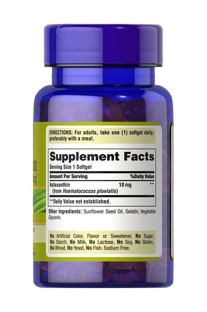 Puritan's Pride Astaxanthin 10mg softgels in a blue bottle, showcasing supplement facts and benefits.
