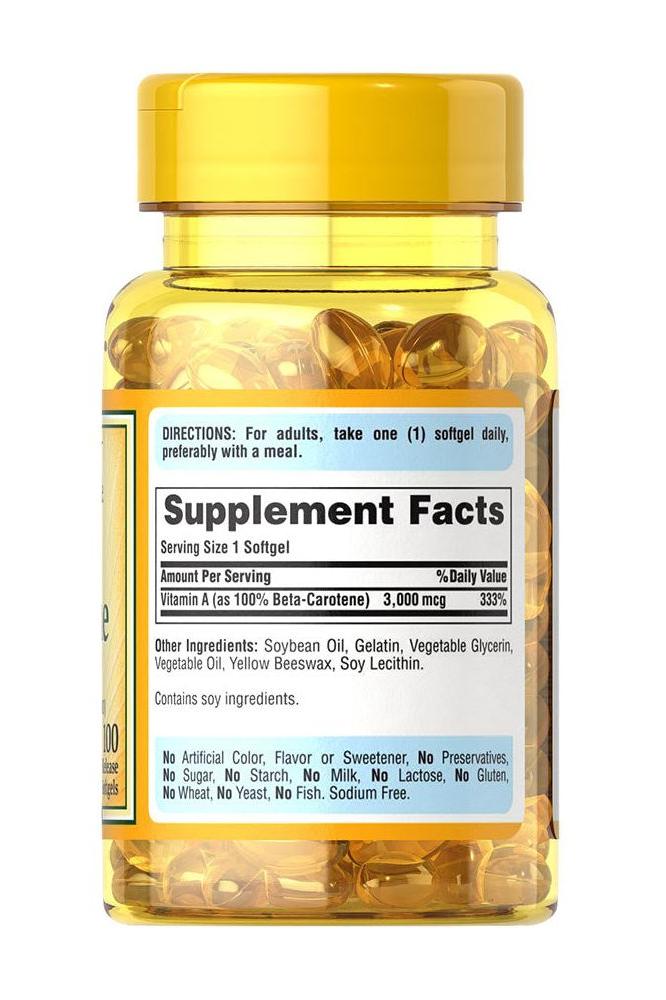 Puritan's Pride Beta-Carotene softgels in a yellow bottle, 10,000 IU, 100 count for eye and immune health.