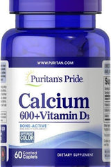 Puritan's Pride Calcium 600 + Vitamin D3 dietary supplement bottle with 60 coated caplets.