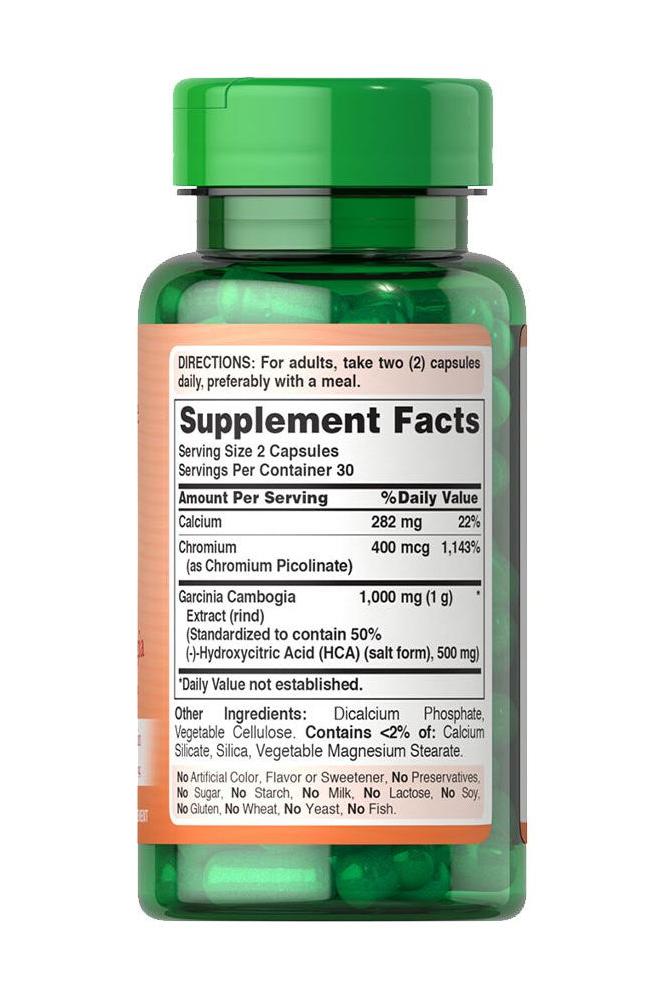 Puritan's Pride Garcinia Cambogia 500 mg supplement bottle with facts and dosage instructions.