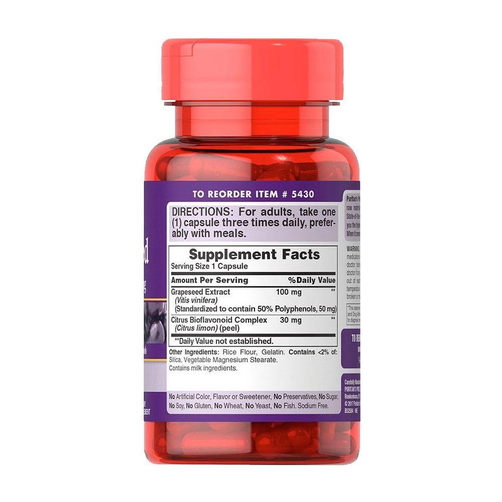 Puritan's Pride Grapeseed Extract bottle featuring supplement facts, 100 mg serving size, and dosage instructions.