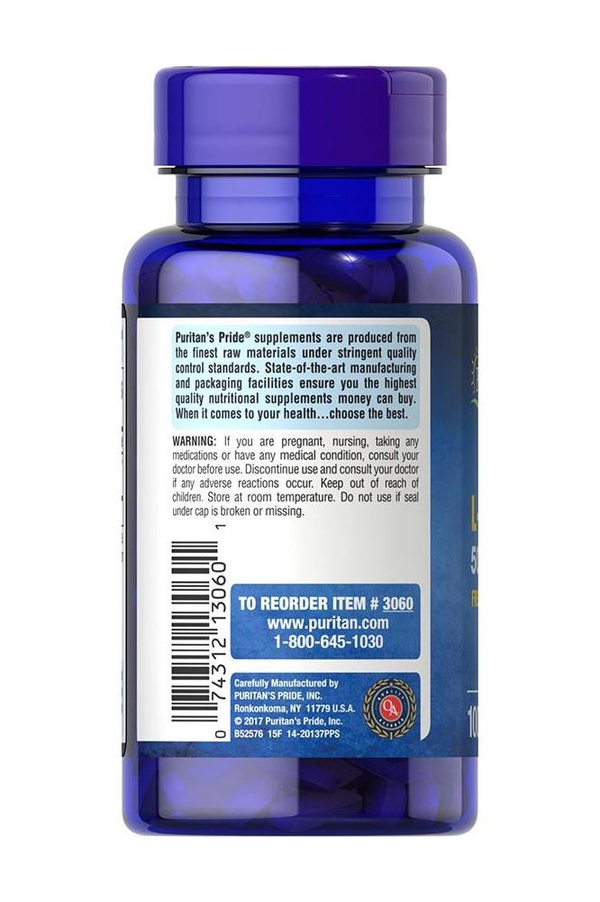 Puritan's Pride L-Lysine 500mg caplets bottle with supplement information and warning label.