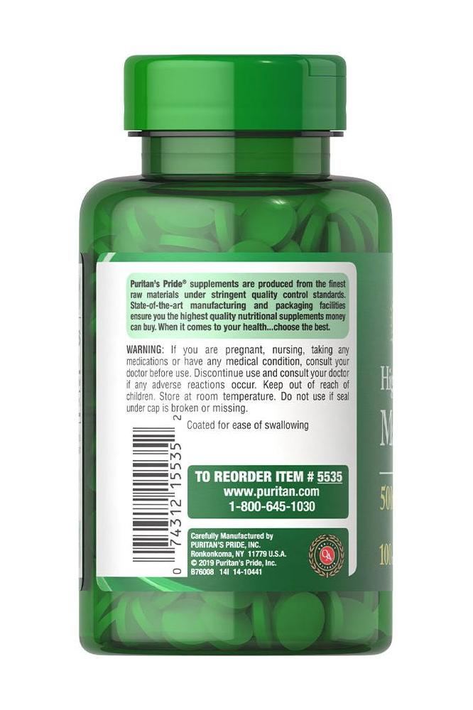 Puritan's Pride Magnesium 500 mg supplement bottle, 100 tablets, green container with dosage information.