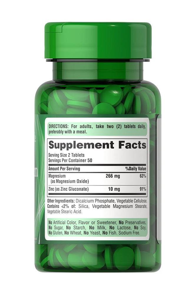 Puritan's Pride Magnesium with Zinc supplement bottle showing nutrition facts and serving information.