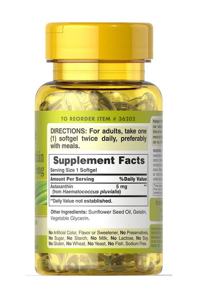 Puritan's Pride Natural Astaxanthin 5 mg softgels bottle with supplement facts label.