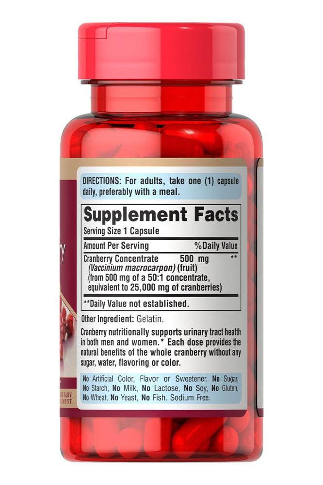 Puritan's Pride Cranberry capsules bottle showing supplement facts and dosage for urinary health.