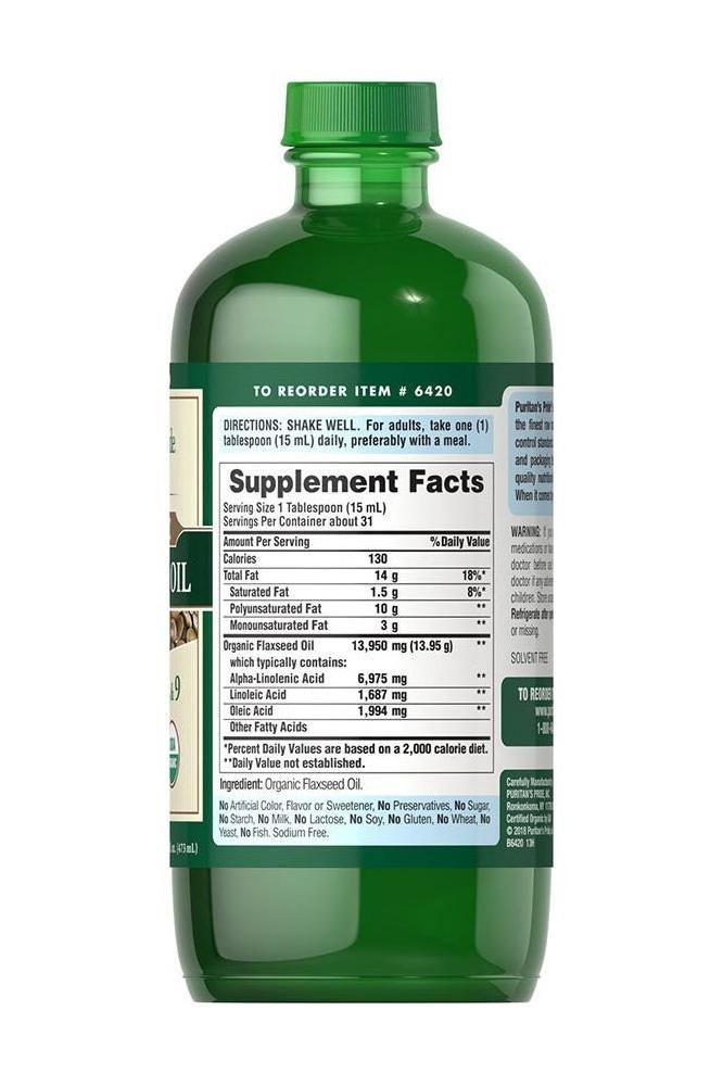 Puritan's Pride Organic Flaxseed Oil 473 ml bottle with supplement facts label.