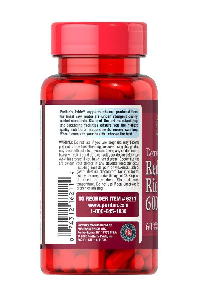 Puritan's Pride Red Yeast Rice 600 mg supplement bottle, supports heart health and is free from artificial ingredients.