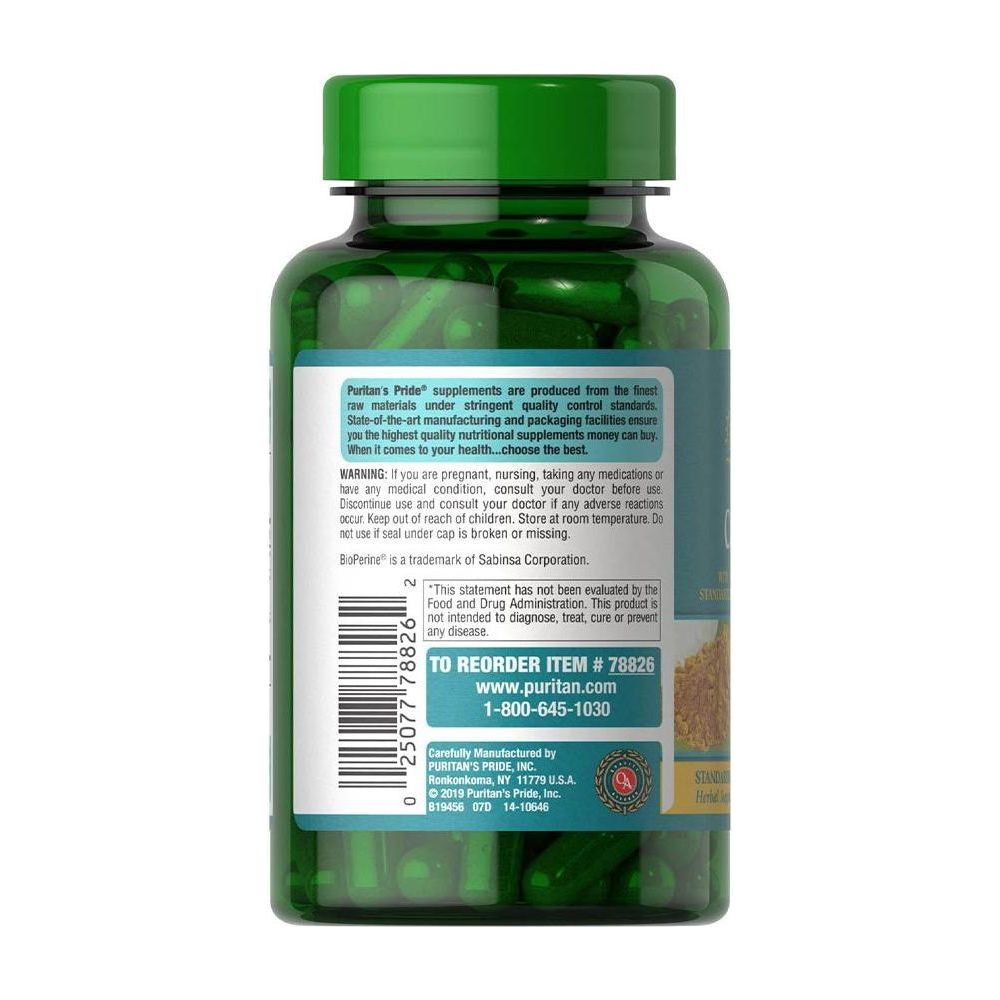 Bottle of Puritan's Pride Turmeric Curcumin 1000 mg with Bioperine capsules for antioxidant support and wellness.