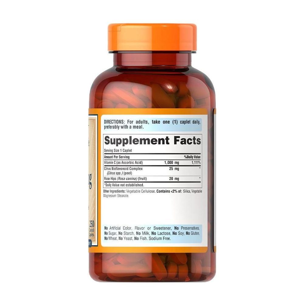 Puritan's Pride Vitamin C-1000 mg supplement bottle with bioflavonoids and rose hips, showing dosage and nutrition facts.