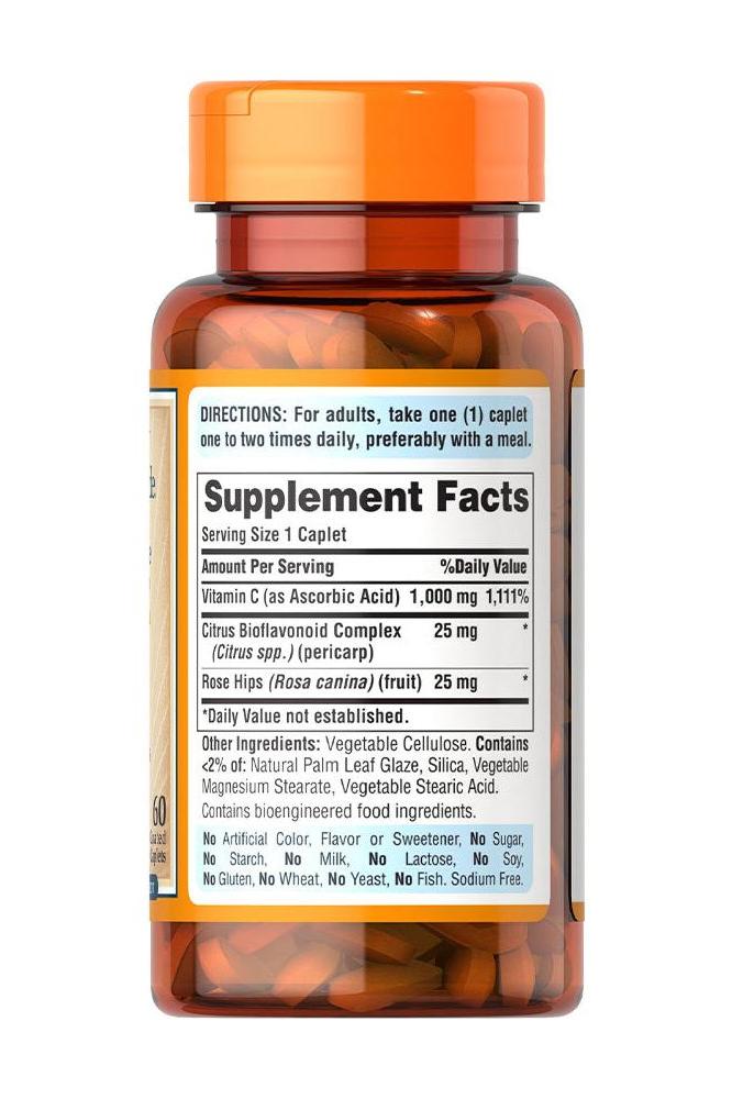 Bottle of Puritan's Pride Vitamin C 1000 mg with Rose Hips, supplement facts and dosage instructions.