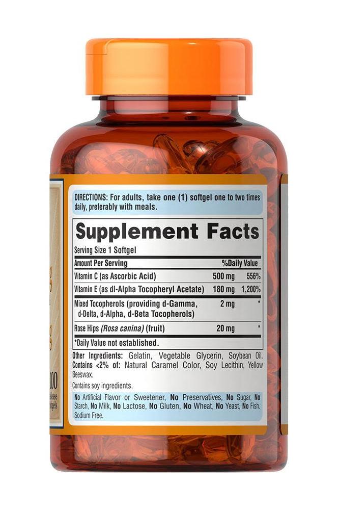 Puritan's Pride Vitamin C & E 500 mg/400 IU softgel bottle with supplement facts label.