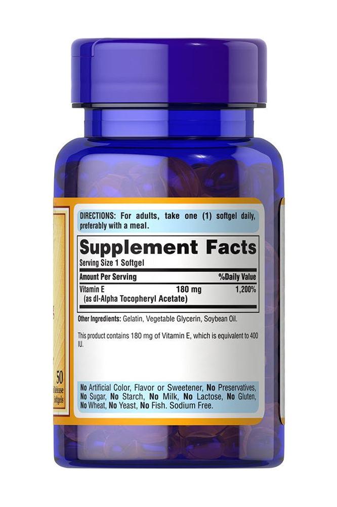 Puritan's Pride Vitamin E 400 IU softgel bottle with supplement facts and dosage instructions.