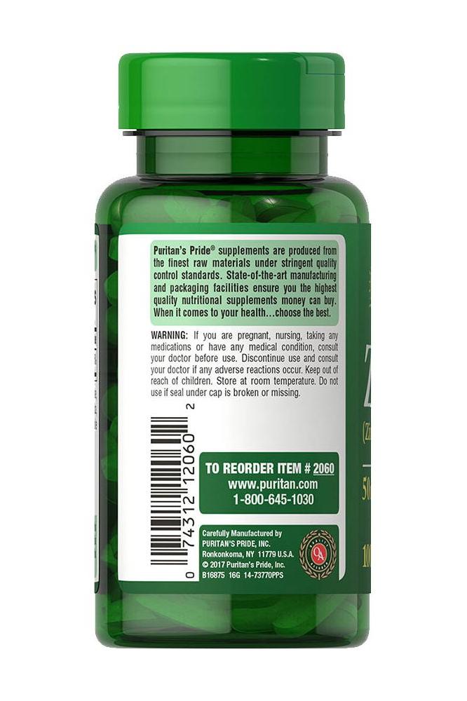 Puritan's Pride Zinc 50 mg supplement bottle side view with label and dosage information.