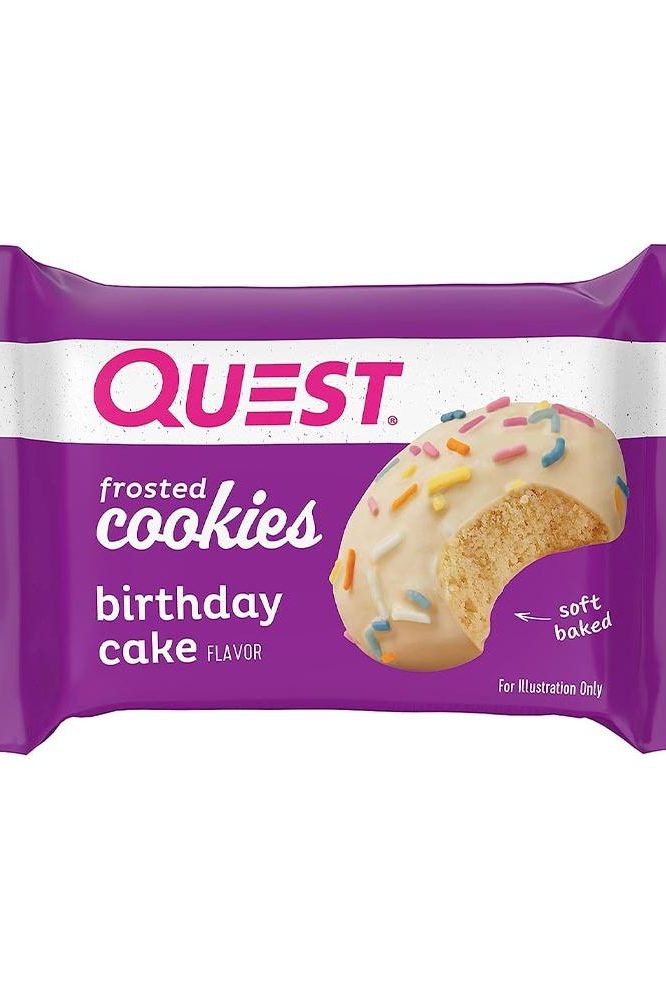 Quest frosted cookies in birthday cake flavor, featuring colorful sprinkles and soft baked texture.