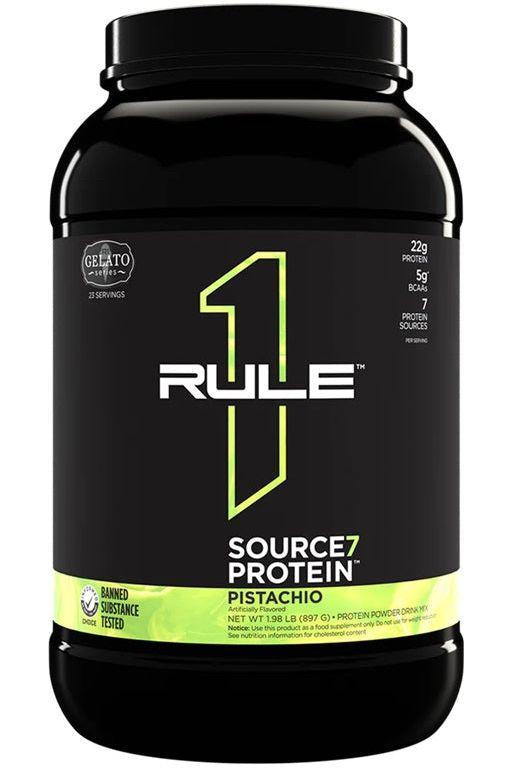 Rule One Source7 Protein in Pistachio flavor, featuring 22g protein from 7 sources in a sleek black container.
