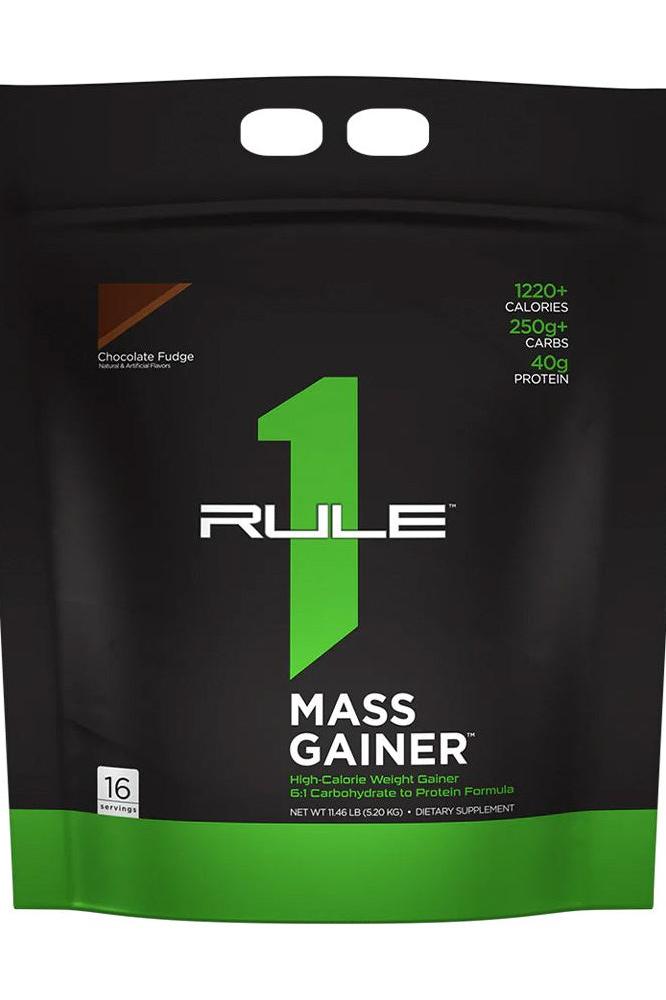 Rule One R1 Mass Gainer bag featuring 1220+ calories, 250g carbs, and 40g protein per serving.