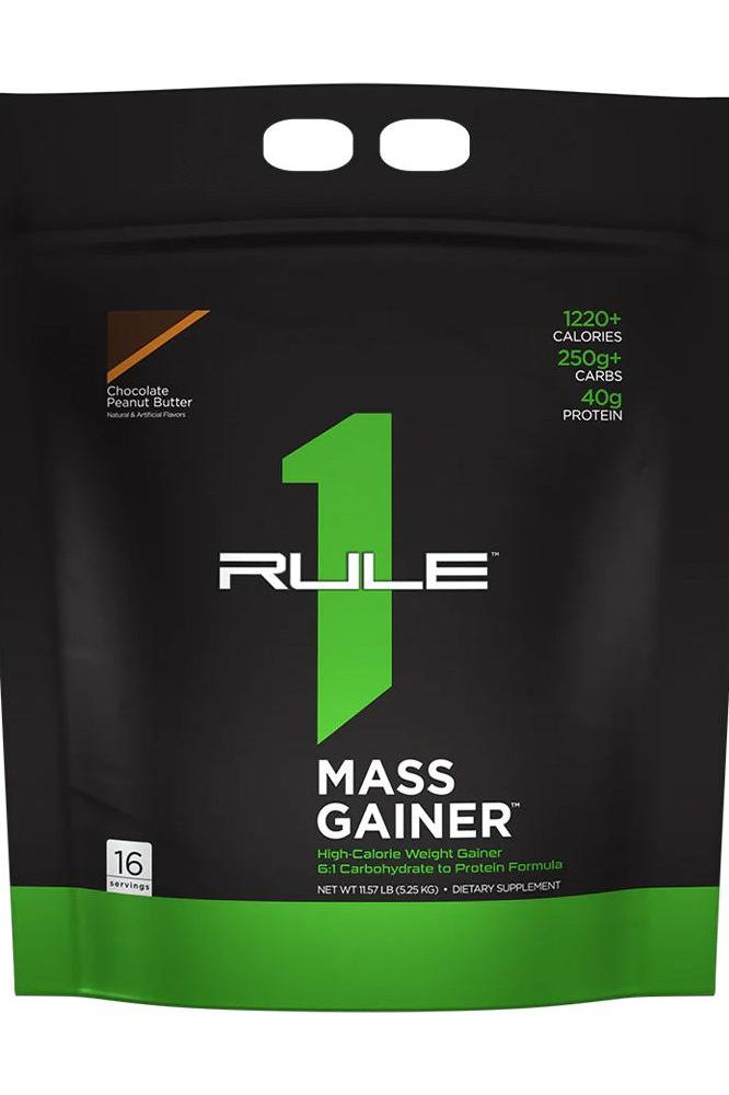 Rule One R1 Mass Gainer protein powder bag, 1220+ calories, 40g protein, chocolate peanut butter flavor.