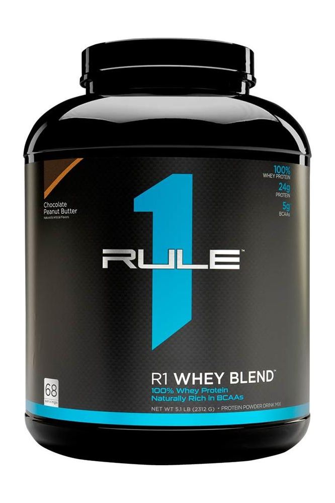 Rule One Whey Blend protein powder container featuring chocolate peanut butter flavor with 24g protein per serving.