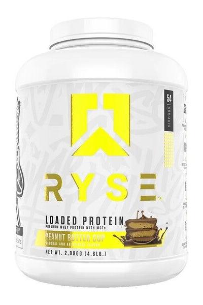RYSE Loaded Protein Peanunt Butter Cup flavor in a white container, featuring premium whey protein and MCTs.