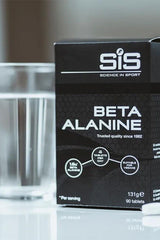 Science in Sport Beta Alanine 90 tablets box with a glass of water, ideal for enhancing athletic performance.