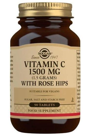 Solgar Vitamin C 1500 mg supplement with rose hips in a brown bottle, vegan and sugar-free, containing 90 tablets.